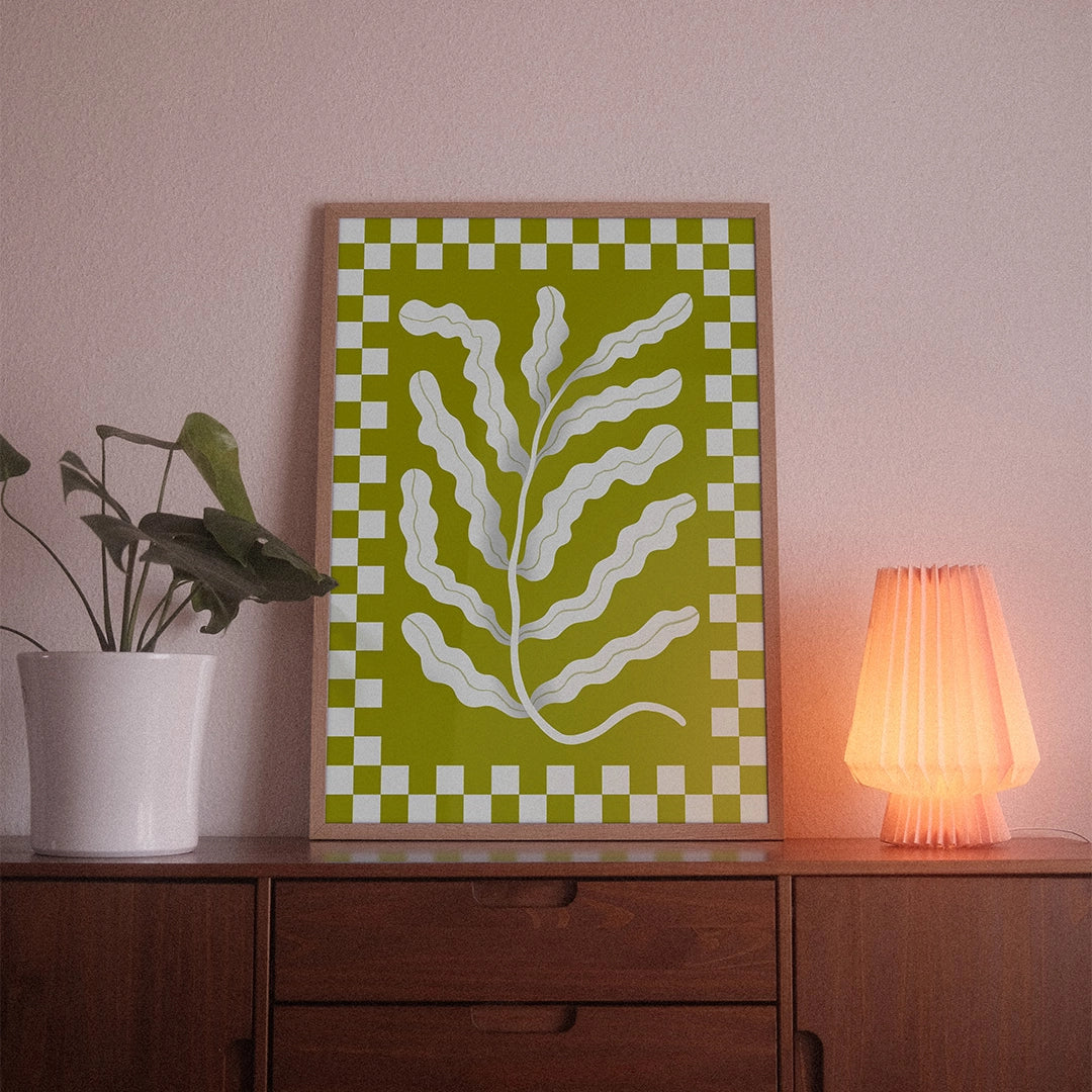 A poster with the illustrative motif “Branch” by POWSTR hanging in a living room.